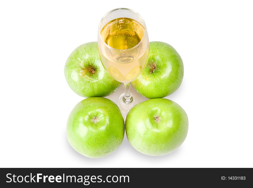 Green apples and fresh juice in a glass. Green apples and fresh juice in a glass