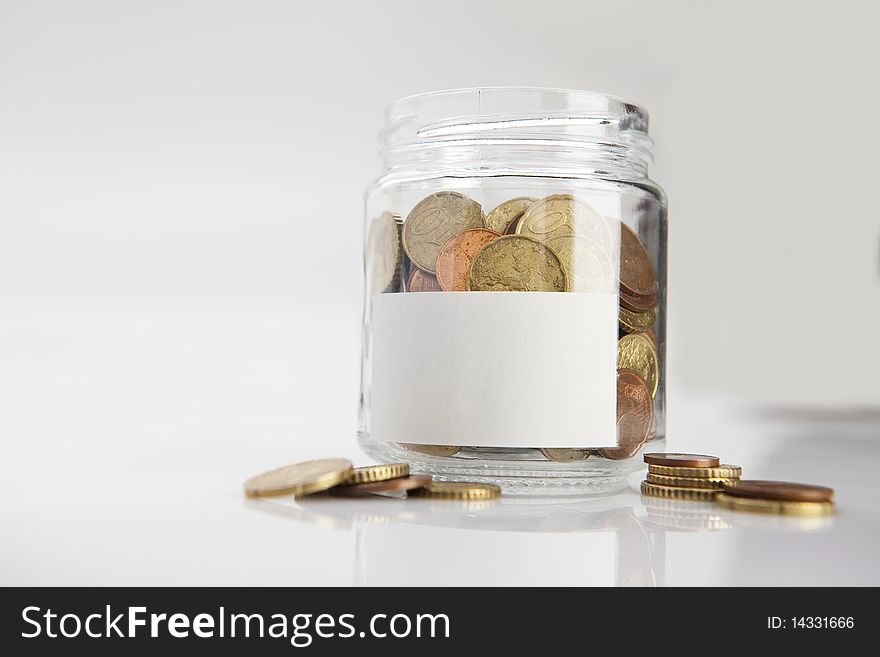 Jar of coins with label