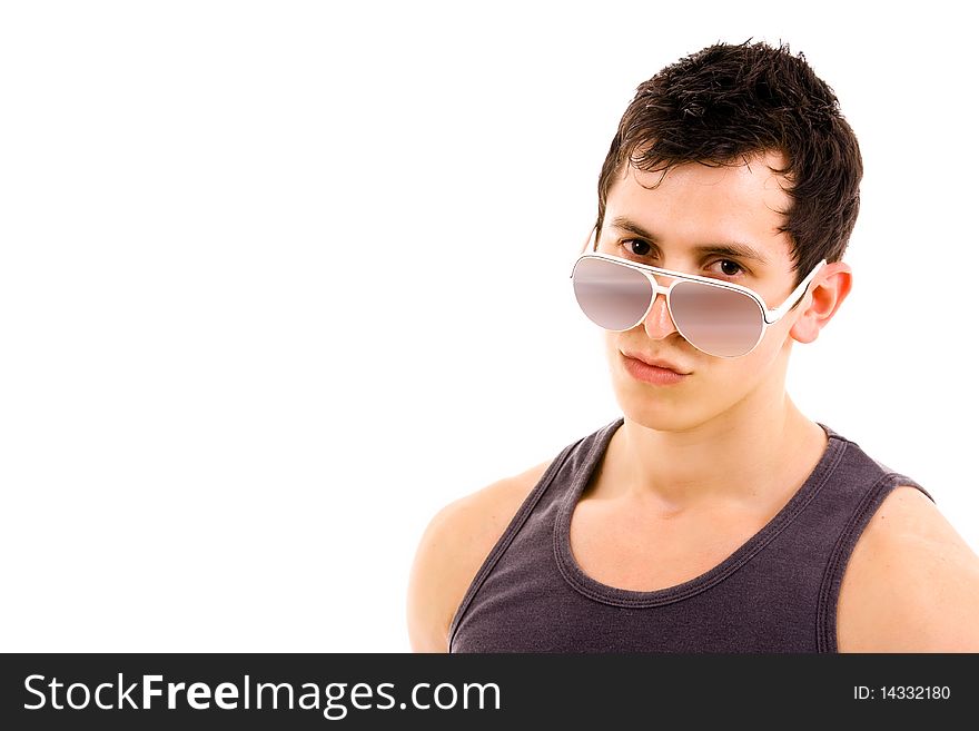 Portrait of stylished young man wearing sunglasses on white background