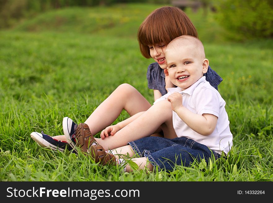 Sister and brother playing outdoor