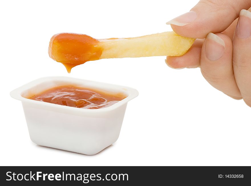 Potato free in ketchup isolated on white background