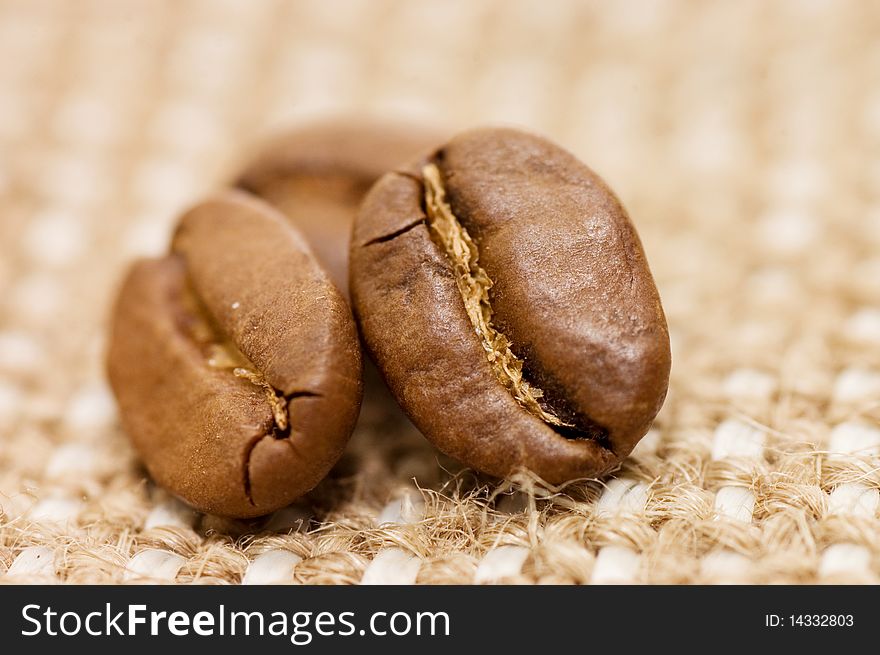 Coffee bean on sacking close up