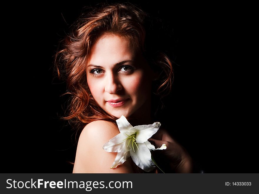 Portrait of a sweet young girl on black background. Portrait of a sweet young girl on black background.