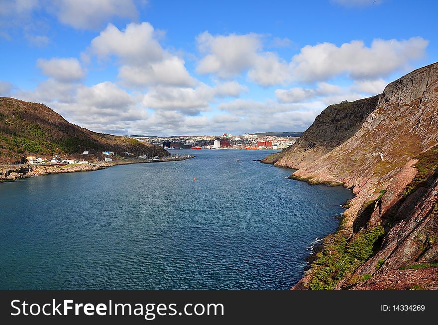 Newfoundland in Canada is known for it's many picturesque coastal harbours and towns. This particular one is of the Capital City of Newfoundland St John's. Newfoundland in Canada is known for it's many picturesque coastal harbours and towns. This particular one is of the Capital City of Newfoundland St John's.