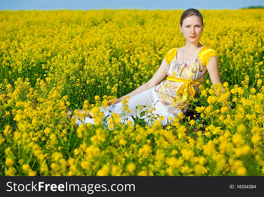 Pretty woman portrait in vivid field, selective focus. Pretty woman portrait in vivid field, selective focus