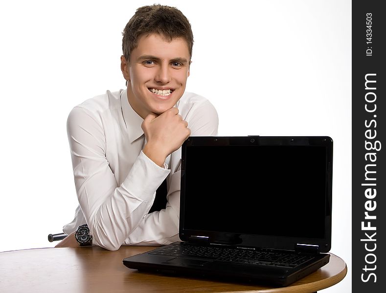 Successful businessman working on laptop.