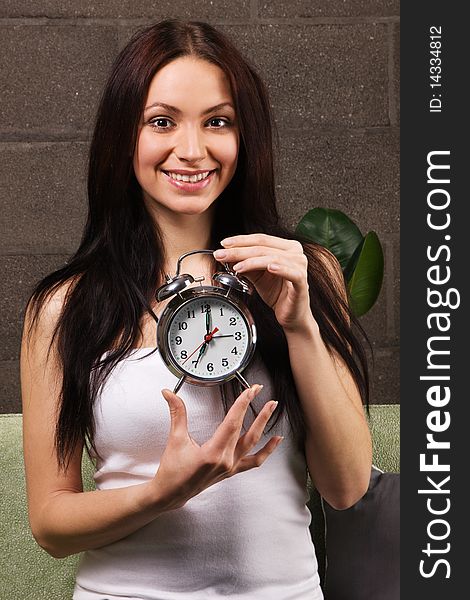 Beautiful Woman Holding Vintage Clock