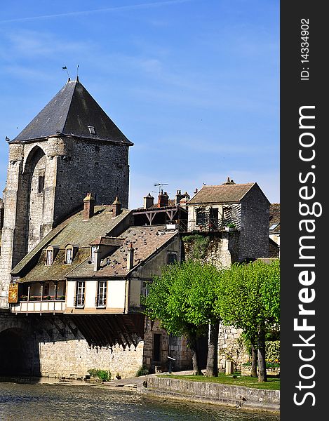 A french medieval town with her tower and her old buildings. A french medieval town with her tower and her old buildings