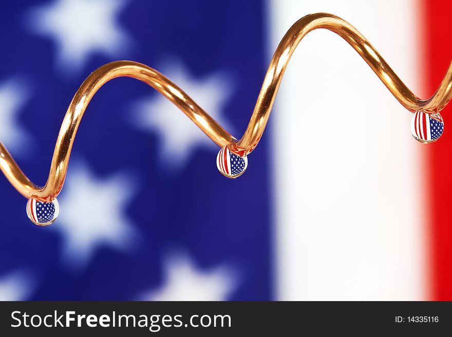Close up on drops of water with American Flag.