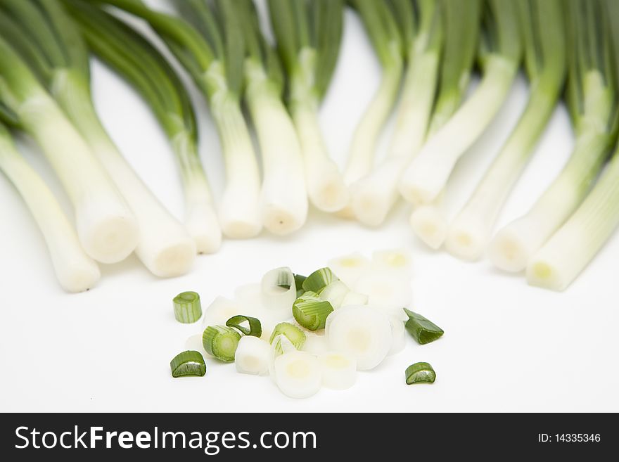 Isolated vegetables - green spring onions