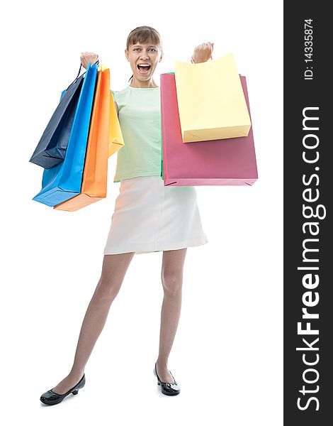 Happy woman with shopping bags over white background