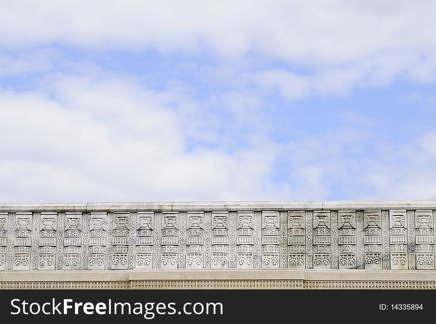 Marble fence and blue sky background