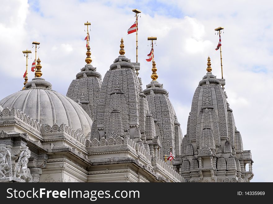 Flags flying on towers of indian temple