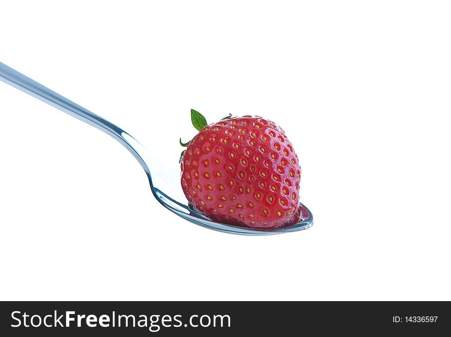 Single ripe fresh strawberry on spoon isolated on white. Clipping path included