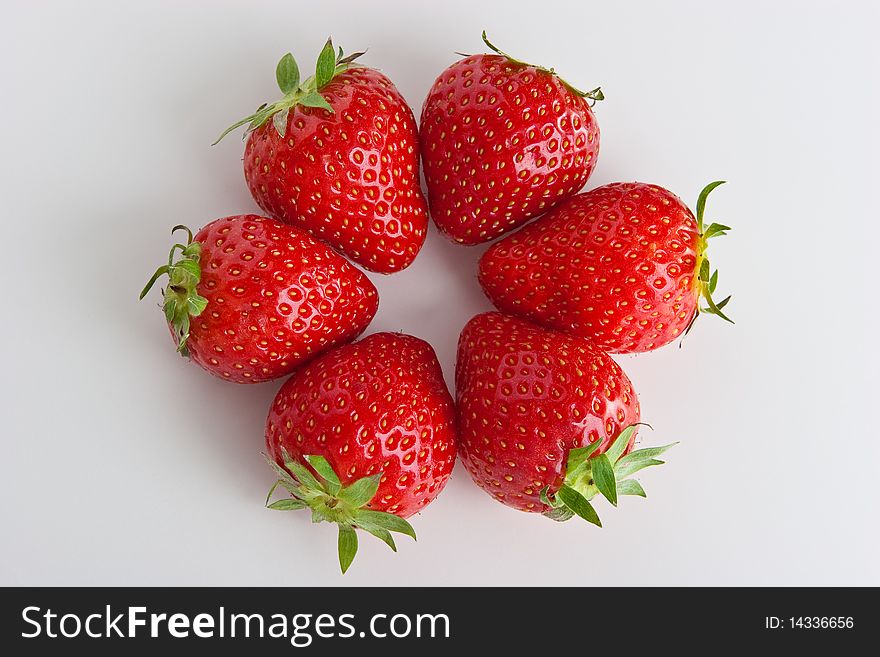 Group of ripe fresh strawberries isolated on white. Group of ripe fresh strawberries isolated on white