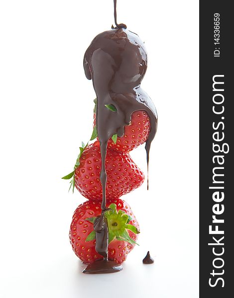 Group of ripe fresh strawberries with chocolate cream isolated on white. Group of ripe fresh strawberries with chocolate cream isolated on white