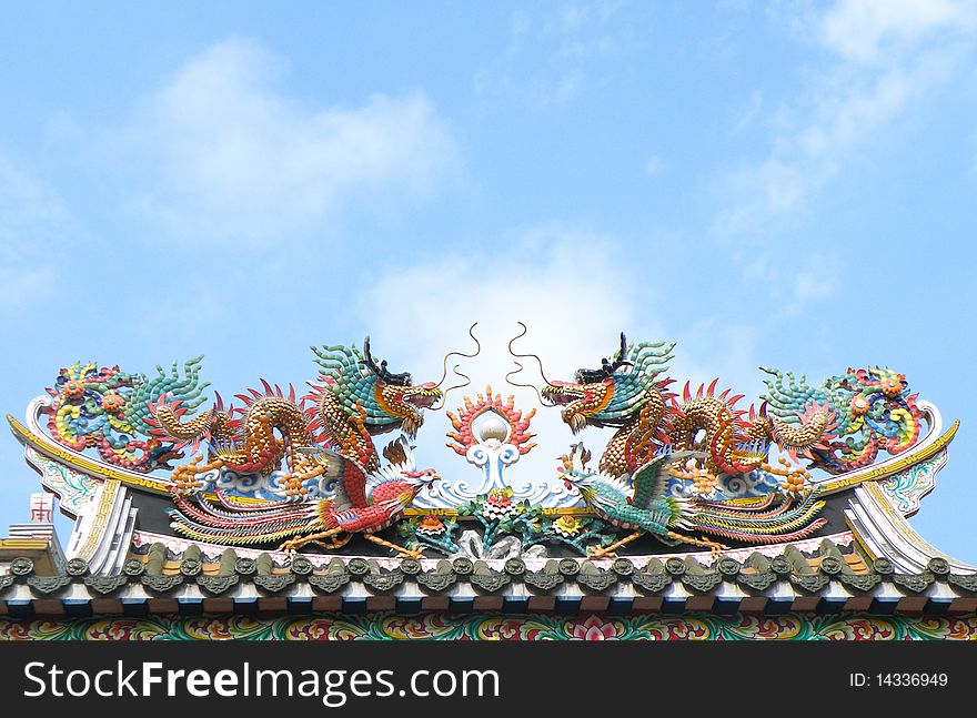 Dragon sculpture on Chinese temple roof in Bangkok. Dragon sculpture on Chinese temple roof in Bangkok