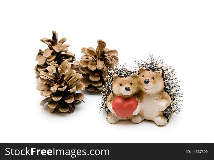 Hedgehog pair with heart and fir cone. Hedgehog pair with heart and fir cone