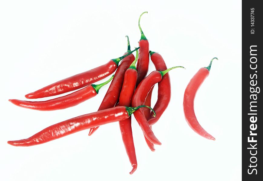 Red chilly on white background