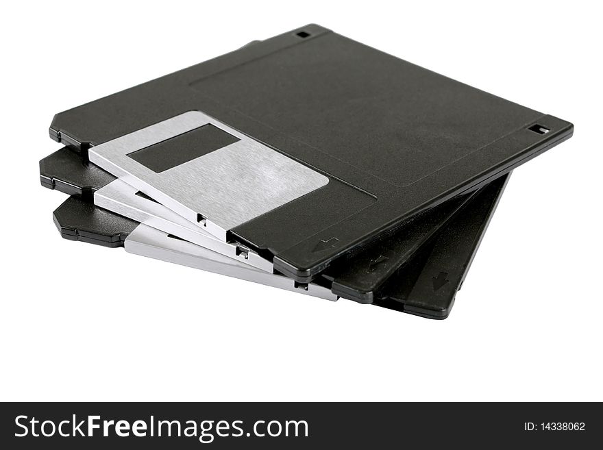 Old black floppy disk on a white background. Old black floppy disk on a white background