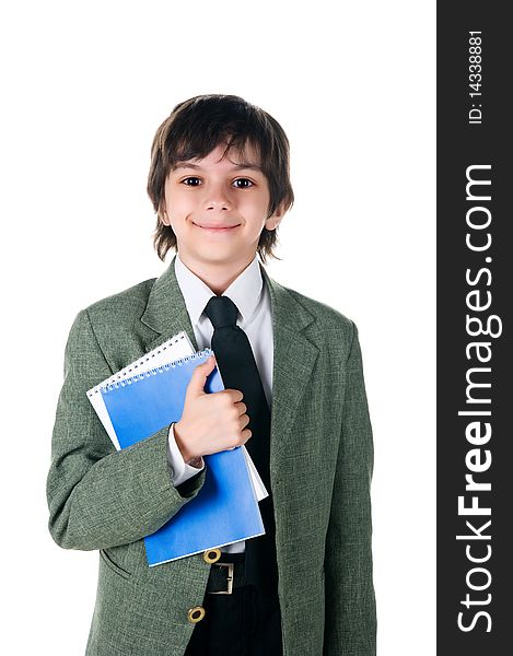 Cute little boy with a notebooks on white background