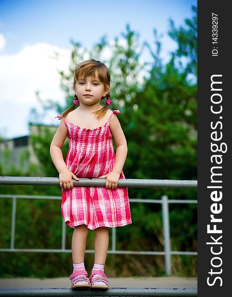 Cute little girl in pink dress