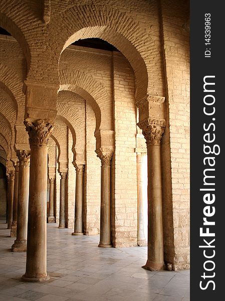 Columns infront the entrance to the Great mosque in Kairuan in Tunisia. Columns infront the entrance to the Great mosque in Kairuan in Tunisia