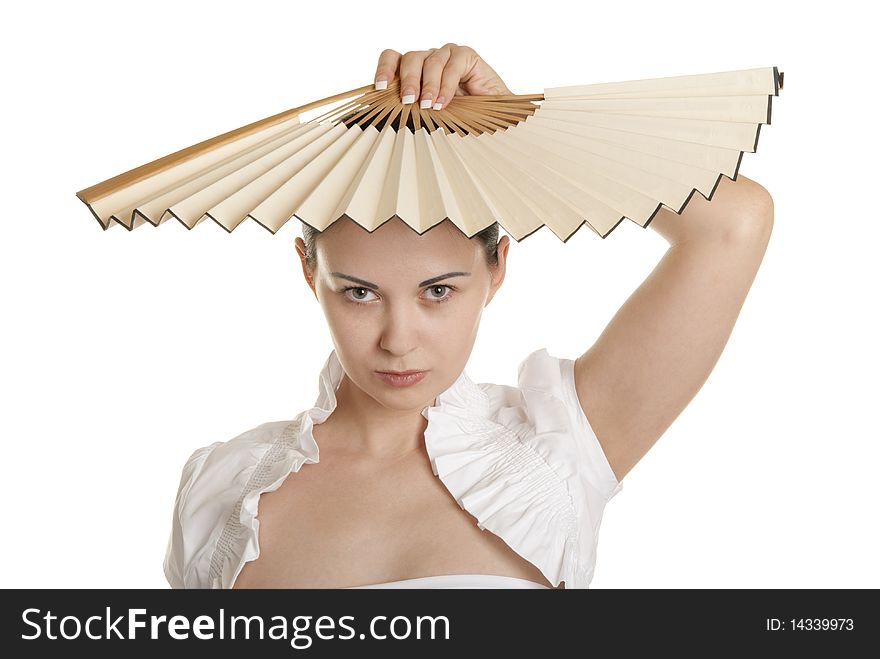 Young woman with fan isolated in white