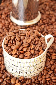 Coffee Beans In A Cappuccino Cup Royalty Free Stock Photos Coffee Beans In A Cappuccino Cup Royalty Free Stock Photos