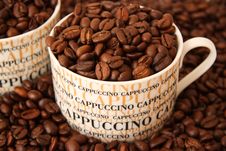 Coffee Beans In A Cappuccino Cup Royalty Free Stock Photos Coffee Beans In A Cappuccino Cup Royalty Free Stock Photos