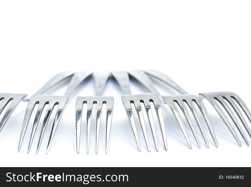 Group of Forks from the aged metal. Isolated on white