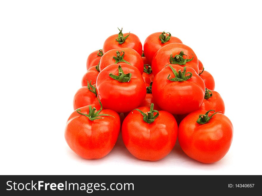 Fresh ripe red tomato on white background. Fresh ripe red tomato on white background