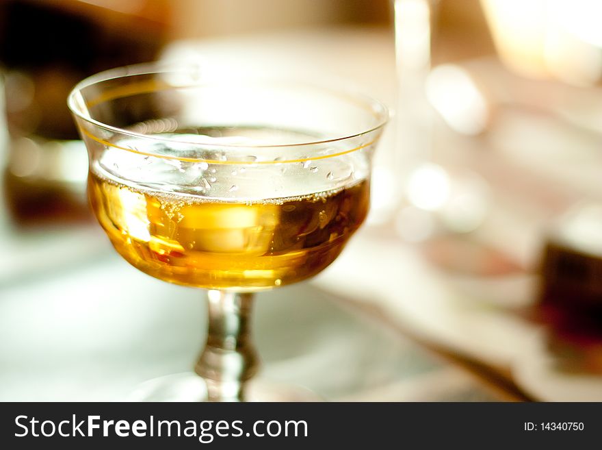 Champagne in a glass with shallow depth of field. Champagne in a glass with shallow depth of field