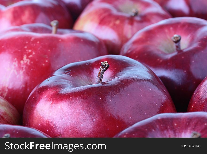 Crop of red apples. Sharpness on one of apples. Crop of red apples. Sharpness on one of apples.