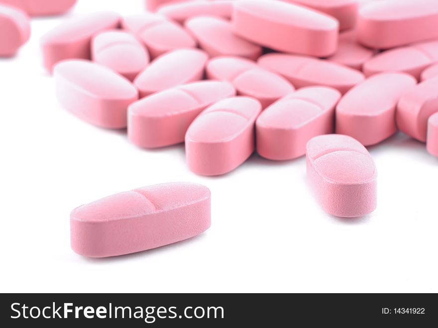 Macro pills on a white background