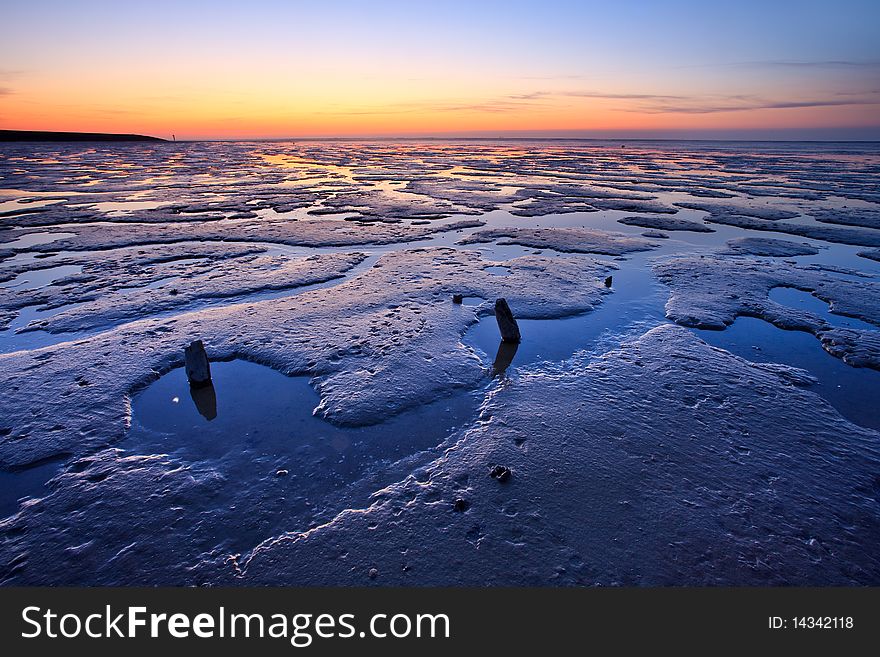 Reflection Of The Sunset In The Ocean