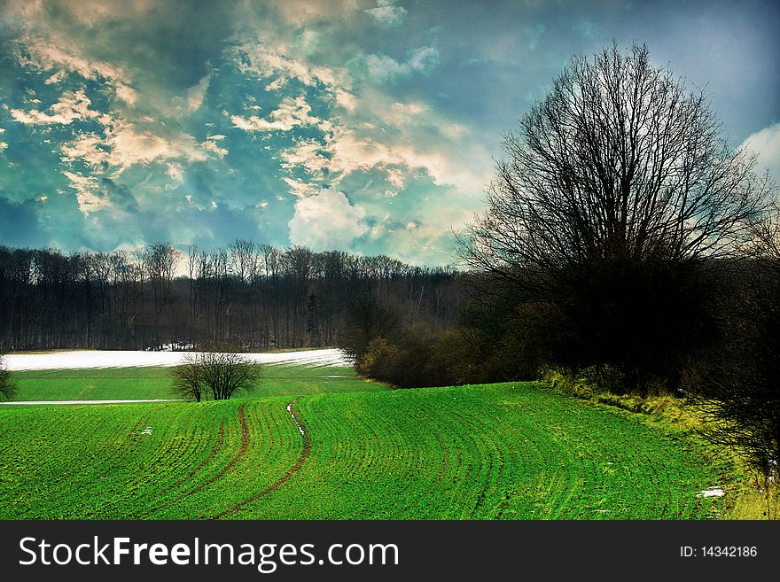 Spring fields with snow - wonderful intense colors