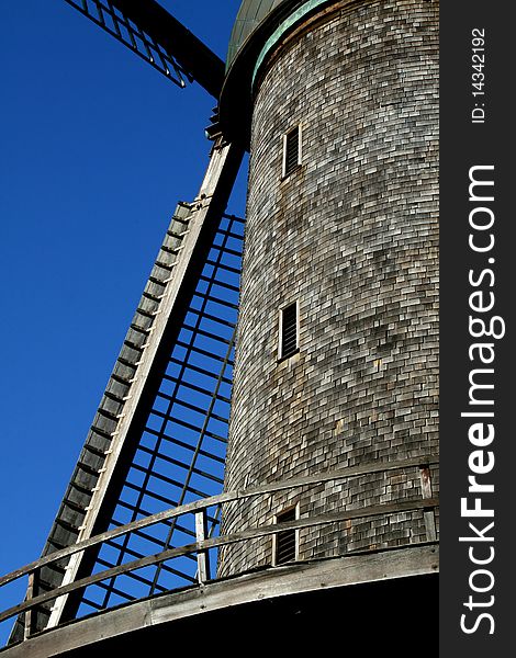 Picture represents an abandoned old wooden windmill