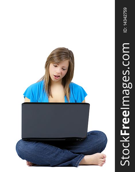 Pretty blond teen with a laptop computer. Pretty blond teen with a laptop computer