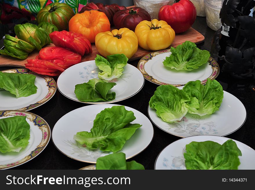 Selection of Heirloom Tomatoes being prepped for a Salad. Selection of Heirloom Tomatoes being prepped for a Salad