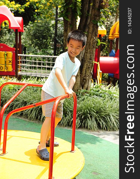 A child playing on playground. A child playing on playground.