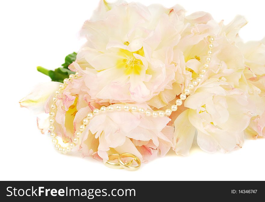 Nice pink peony tulip with wedding gold rings and pearl isolated on the white. Good image for invitation. Nice pink peony tulip with wedding gold rings and pearl isolated on the white. Good image for invitation.