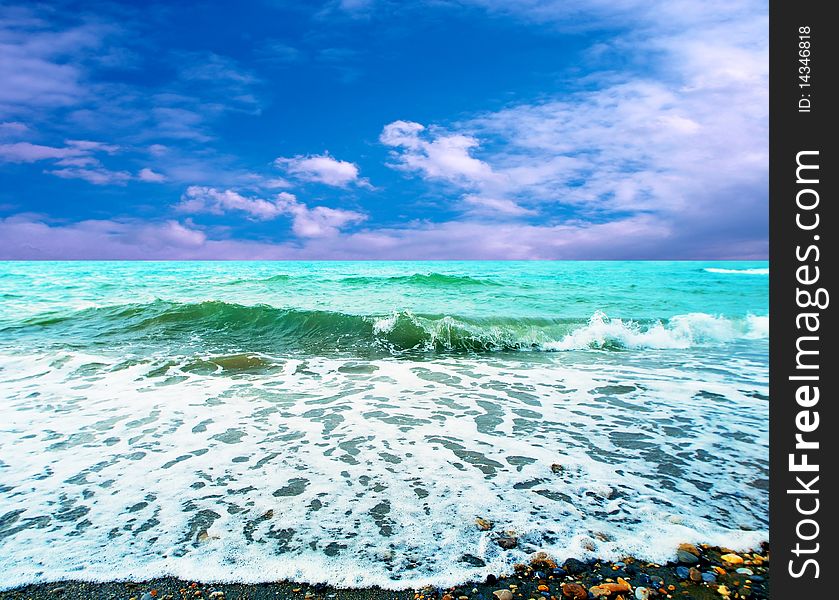 Tropical beach on the ocean or sea with waves