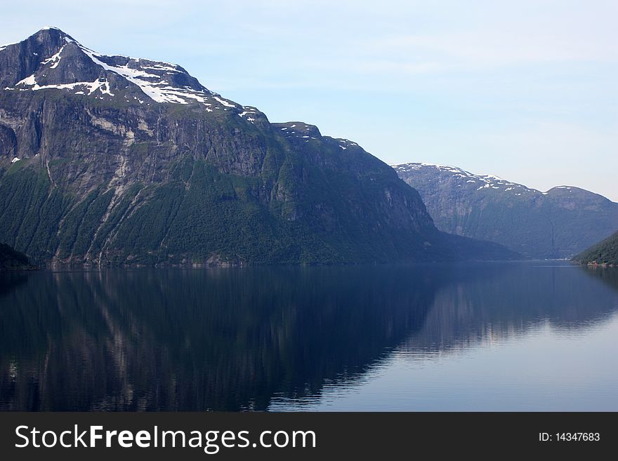 The image of the fjords of Norway early in the morning. The image of the fjords of Norway early in the morning