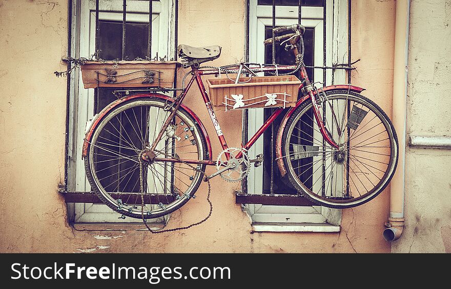 Old decorative bicycle on window
