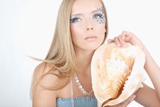 A Girl With A Seashell In His Hands, With A Sea Of Royalty Free Stock Photo