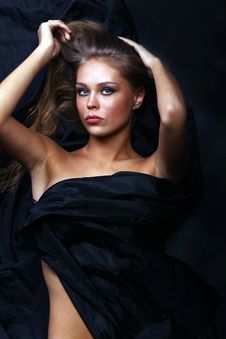 Beautiful Woman Lies On Black Stock Photo Beautiful Woman Lies On Black Stock Photo