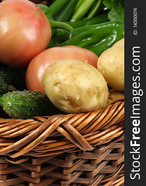 A basket of vegetables still life