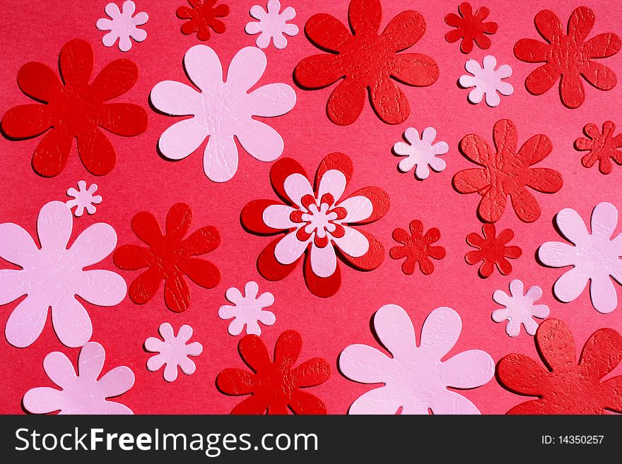 Red and pink paper flowers background. Red and pink paper flowers background