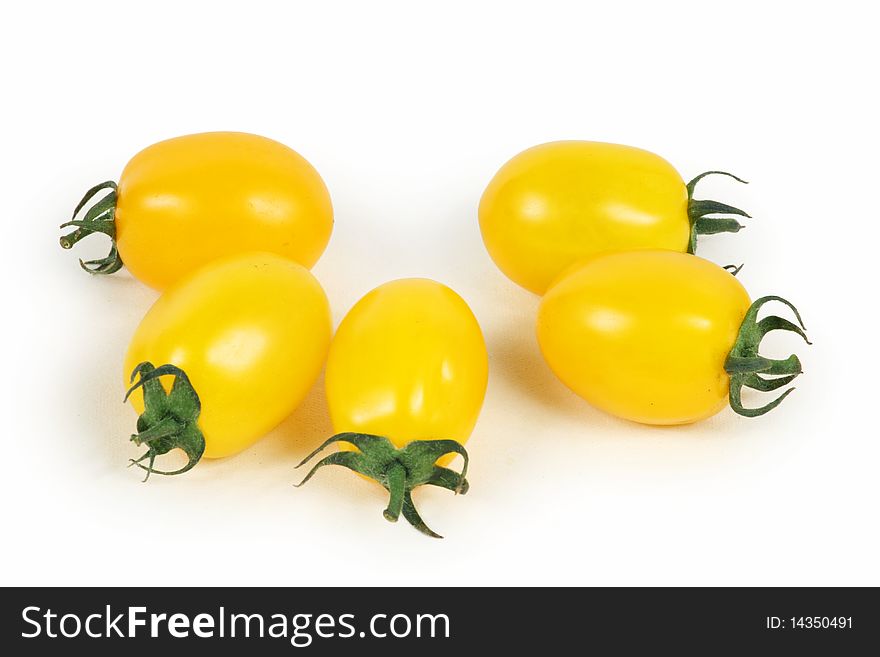 Five yellow Persimmon on white background
